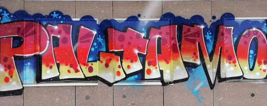 Paltamo-graffiti maalattuna seinään